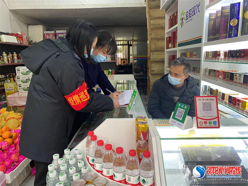 新邵县税务局志愿者开展“敲门行动”助力疫情防控工作