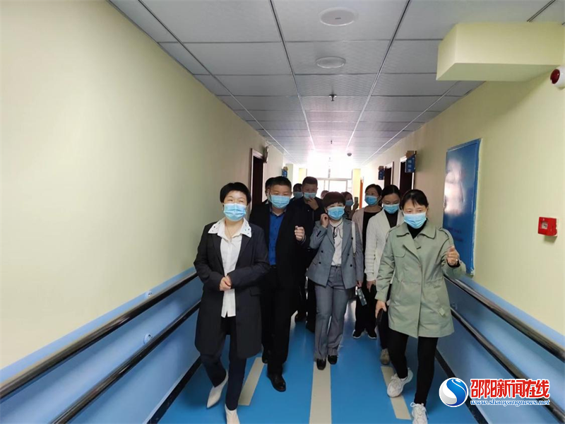 邵阳市残联调研洞口县残疾人工作