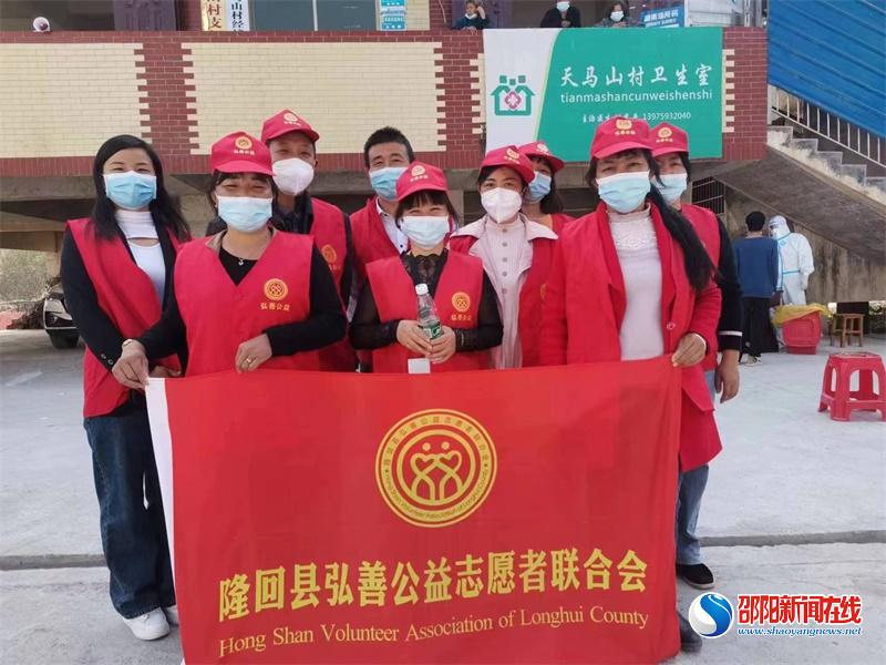 隆回县弘善公益志愿者：绘就“疫”路风景线