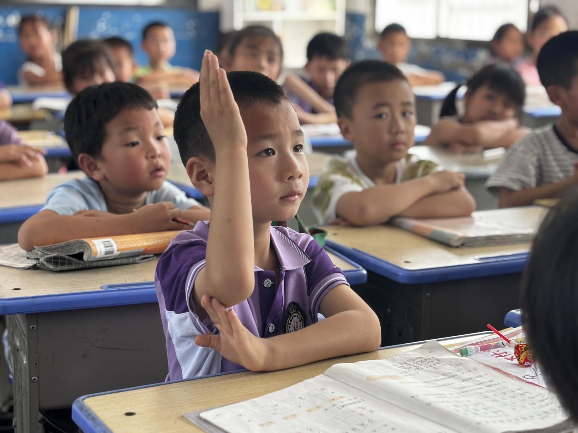 武冈市邓家铺镇中心幼儿园开展“参观小学初体验 幼小衔接零距离”主题活动