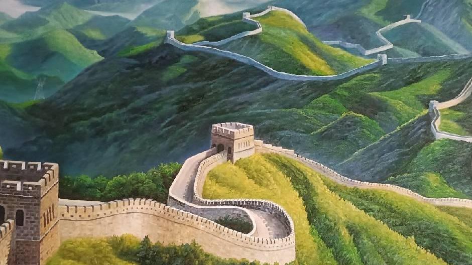 隆回七旬退休老人自学画画 11幅墙绘添彩美丽乡村