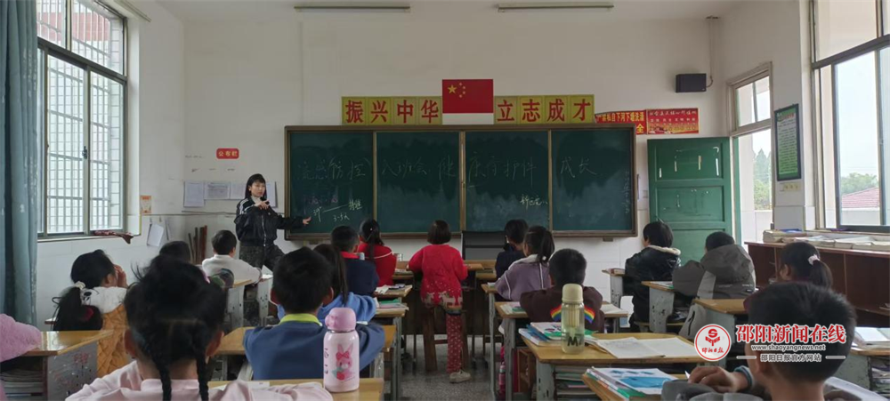 洞口县竹市镇新西完全小学开展流感预防班会